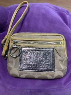 Coach Tan Signature Canvas Wristlet with Yellow Trim and Silver Patch